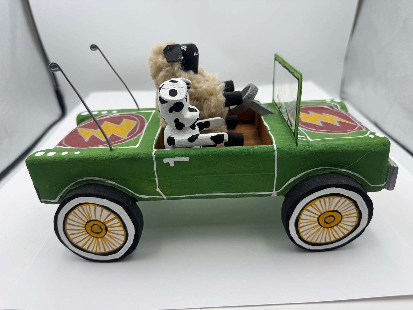Delbert Buck Sheep and Dog in Green Car #0030